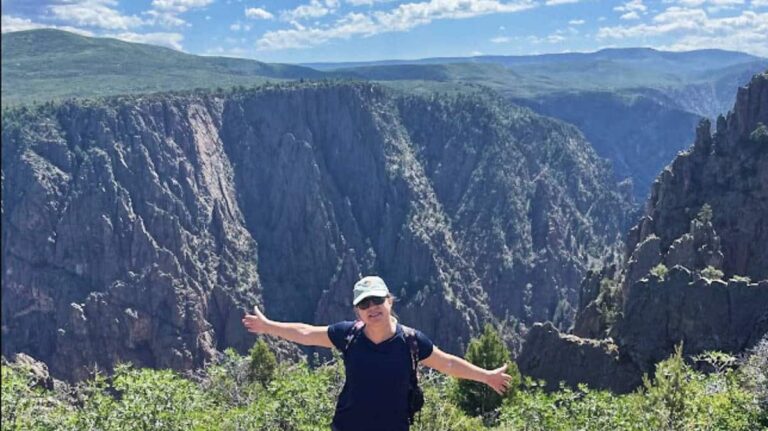 The author, Laura Falin posing for a photo at the Black Canyon