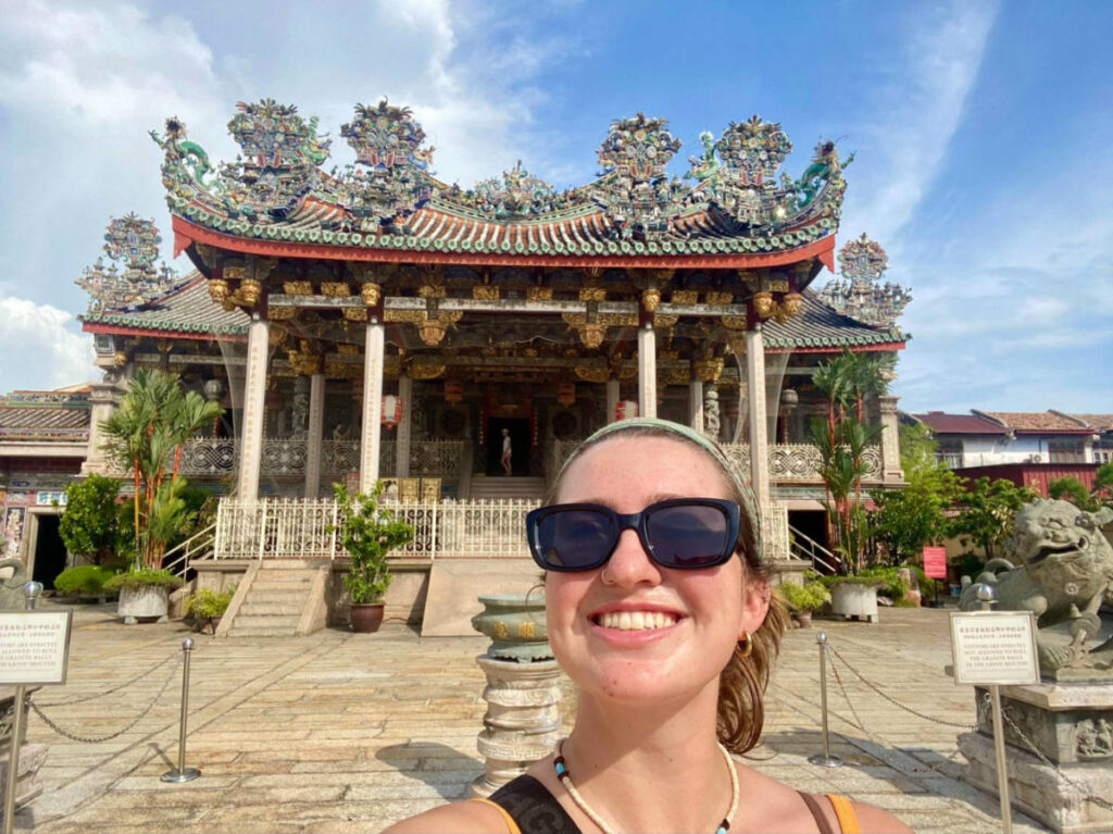 Author Laura taking a selfie at a Chinese ancestral temple