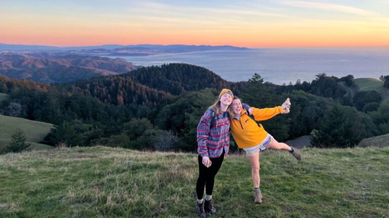 Author Laura and friend watching the sunset while hiking in Mt. Tamalpais State Park