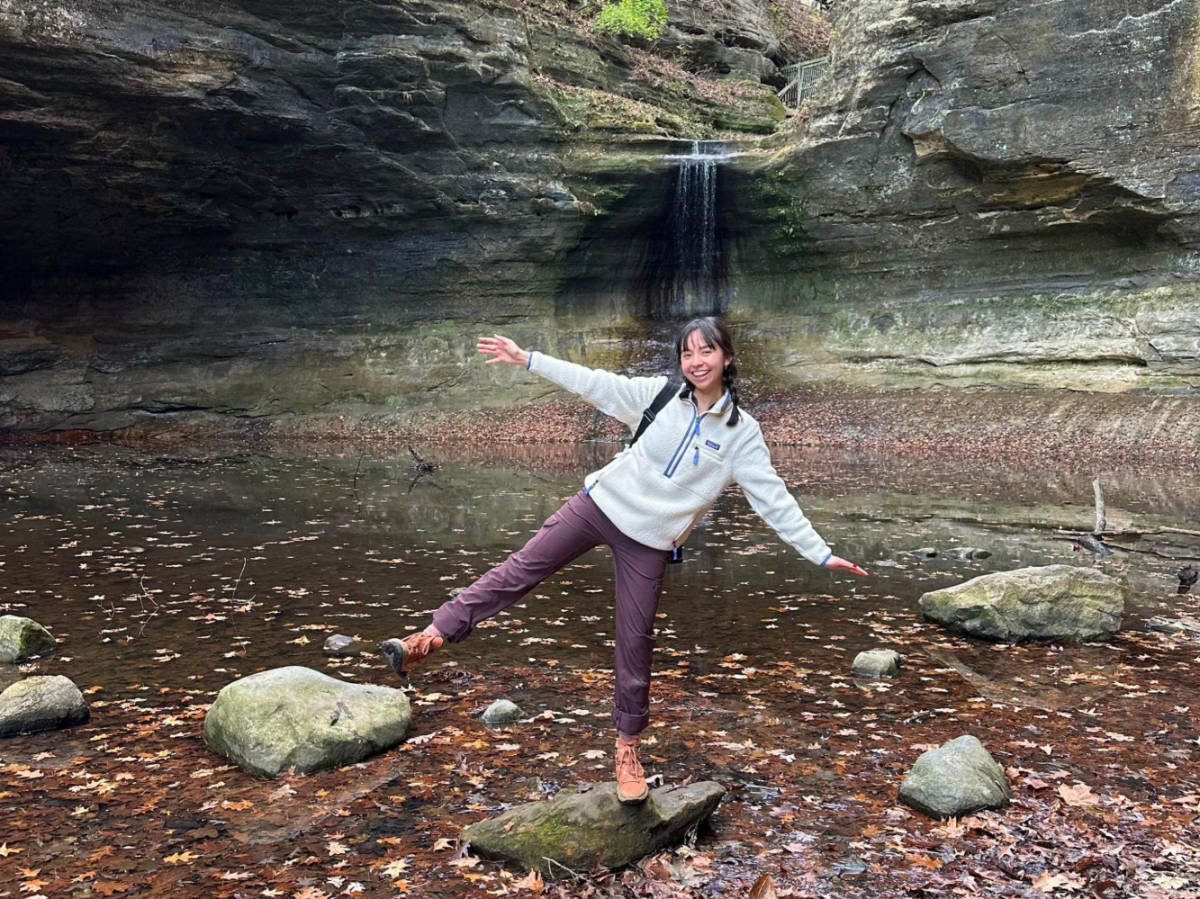 Author Lea Rose standing on a rock at Matthiessen State Park