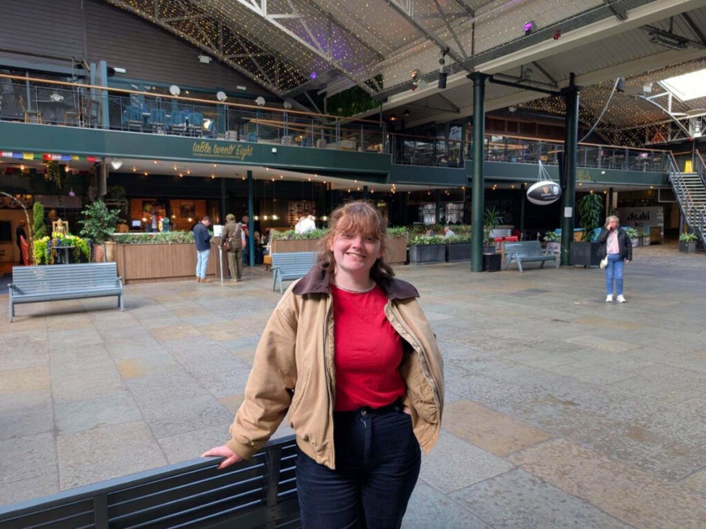 Author Louise standing inside Merchant Square