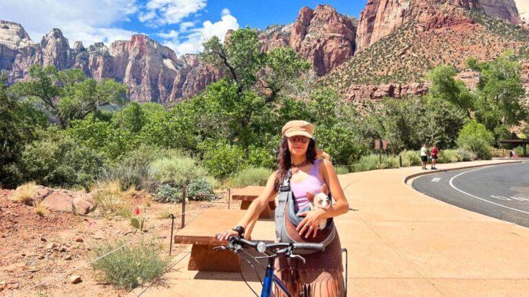 The author McKenna Mobley with her dog on a bike at Pa’rus Trail