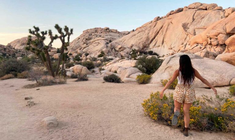 Author Mckenna having fun while posing for a photo in Joshua Tree National Park