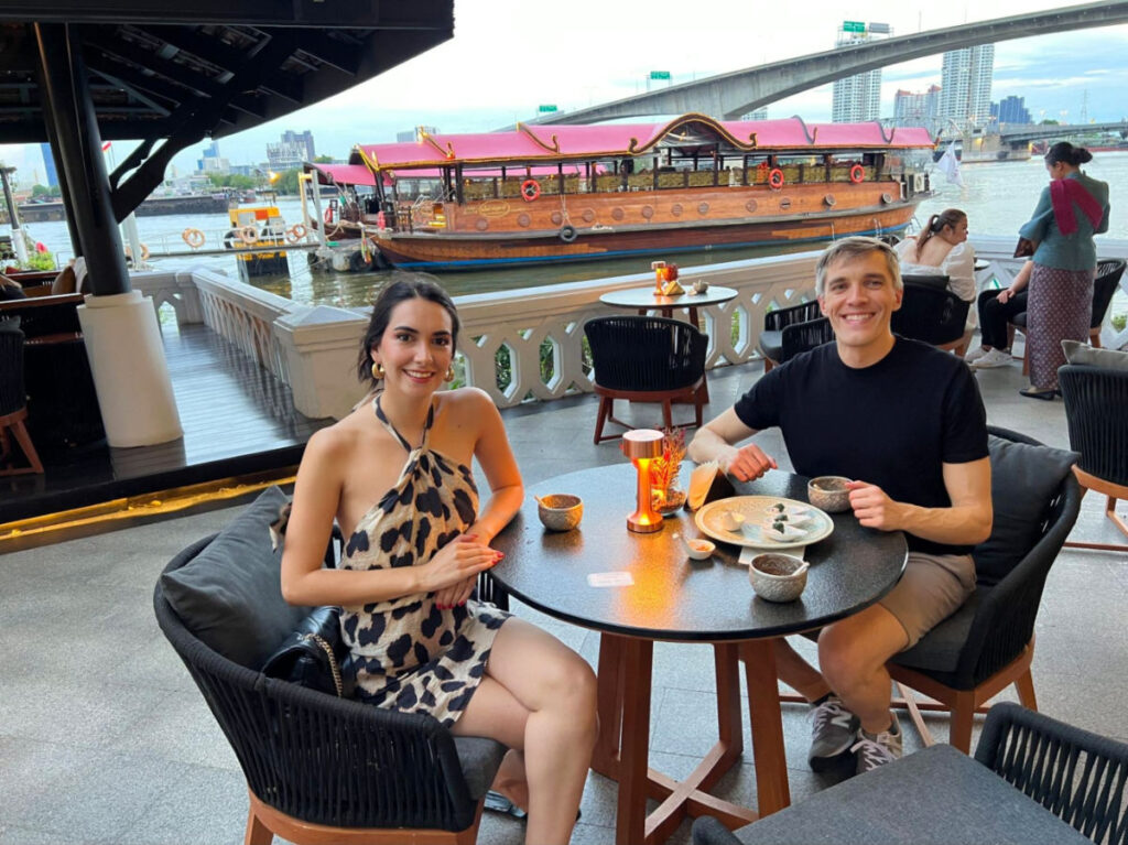 Author Nate and Clara waiting for their Manohra dinner cruise at the Anantara Riverside
