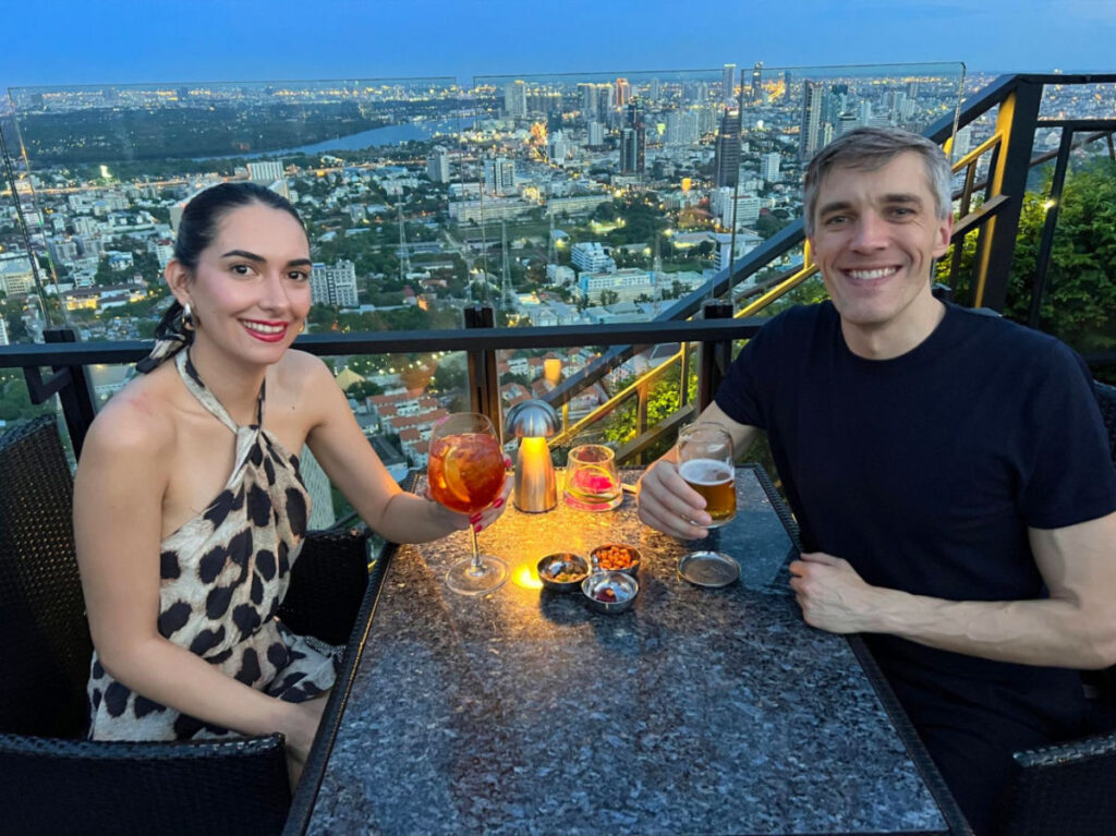 Author Nate and Clara enjoying some drinks at the Banyan Tree rooftop