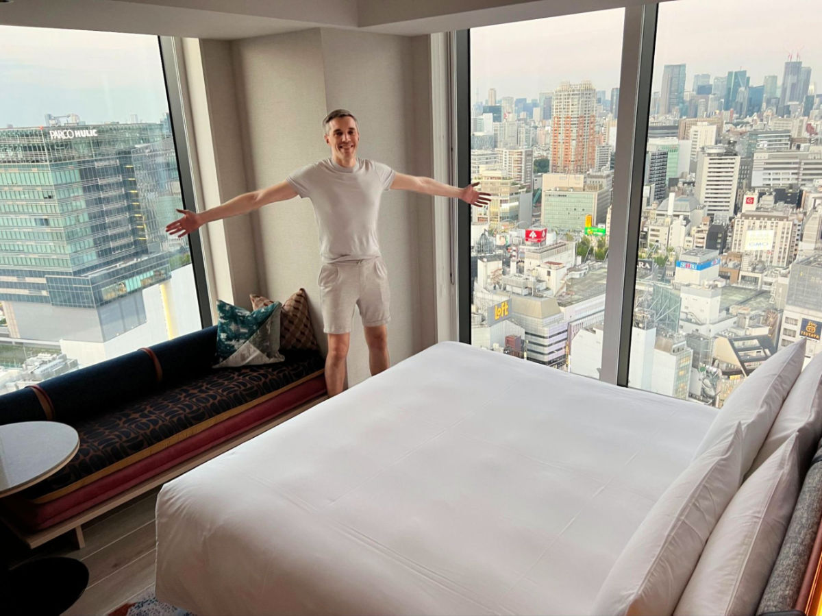 Author Nate showing the views of from a room at Hotel Indigo Tokyo Shibuya