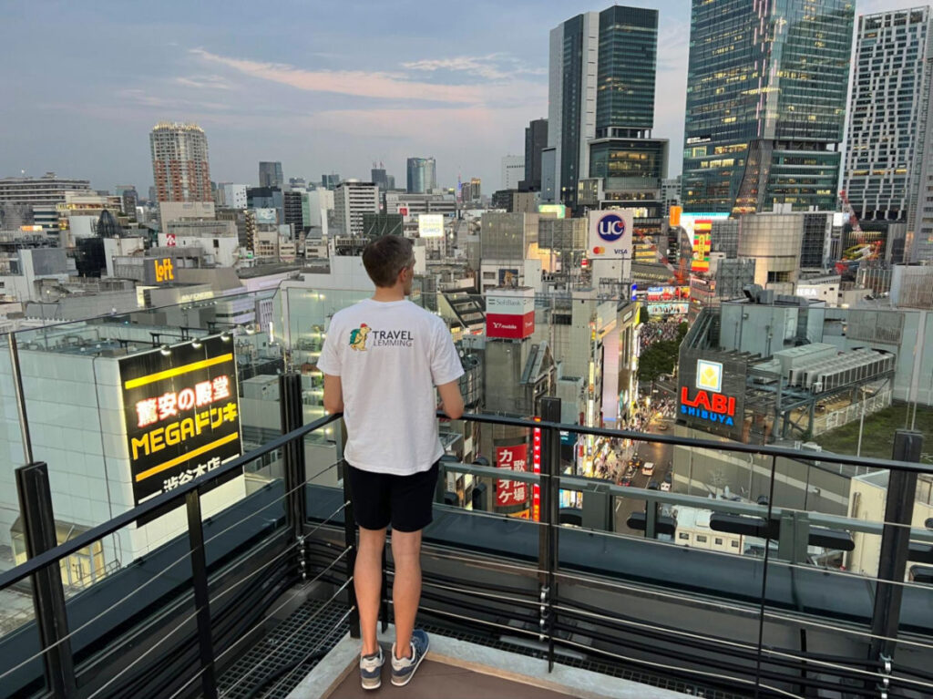 Author Nate looking out over Shibuya from the Hotel Indigo terrace