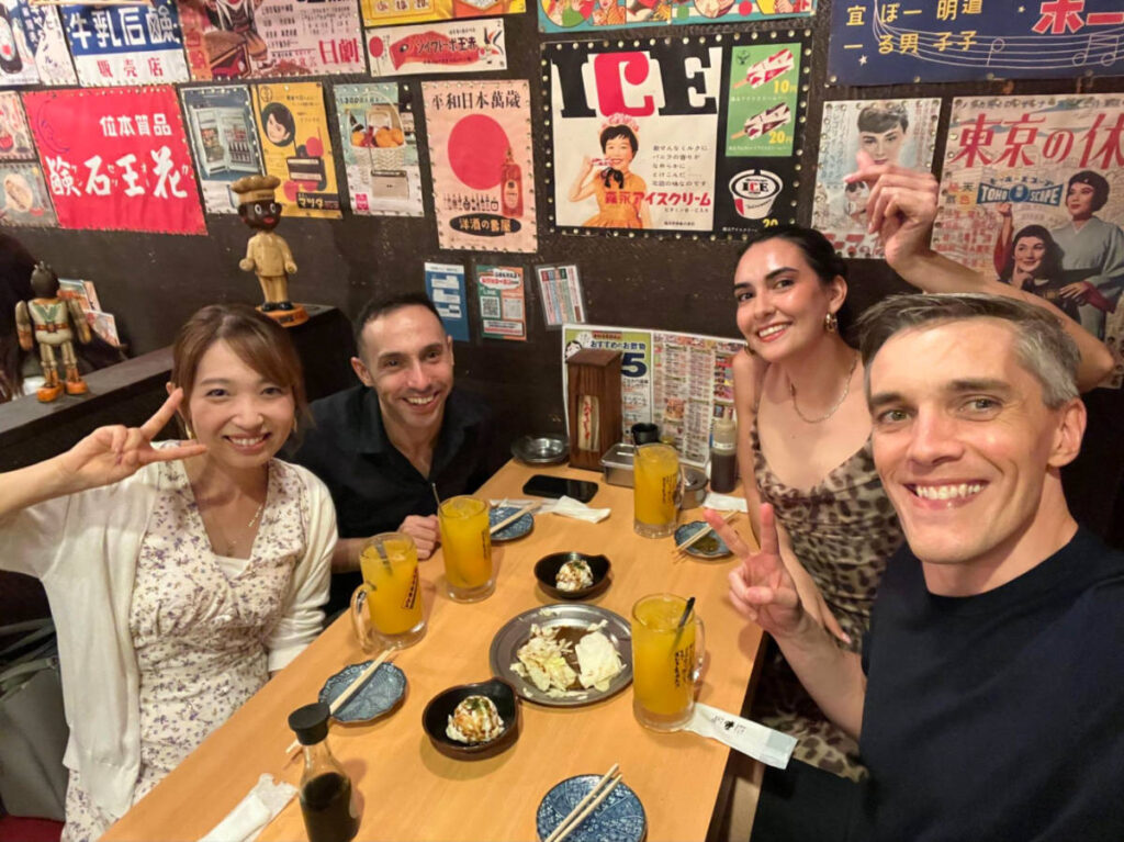Author Nate with friends eating Japanese foods at Hakuritabai Hanbey Shibuya Dogenzaka