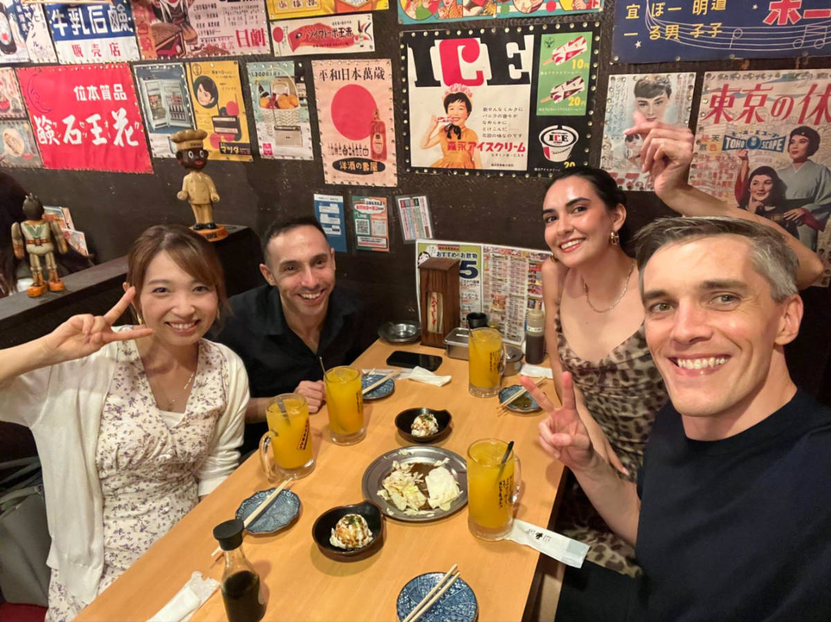 Author Nate with friends eating Japanese foods at Hakuritabai Hanbey Shibuya Dogenzaka