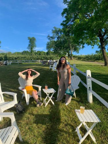 Author Niamh and her friend relaxing and having a drink at Pennings Farm Cidery