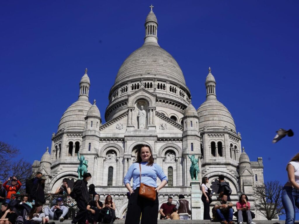 Author Rachel in front of the Sacré Coeur Basilica
