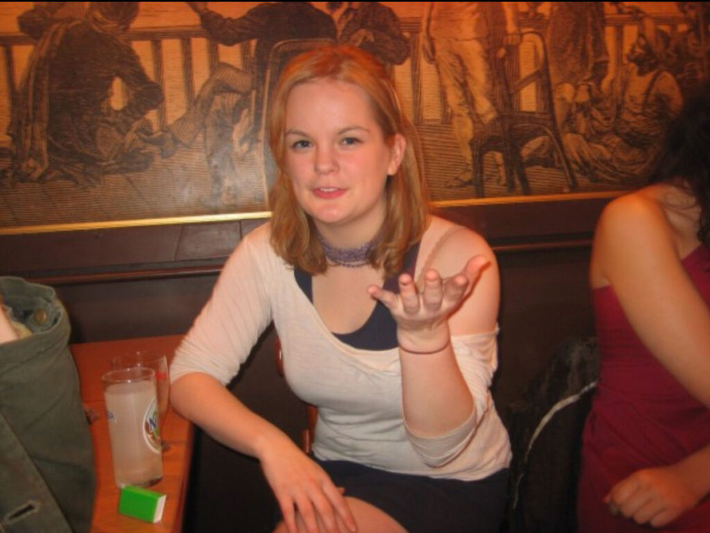 Author Rachel enjoying her drink at La Perle bar