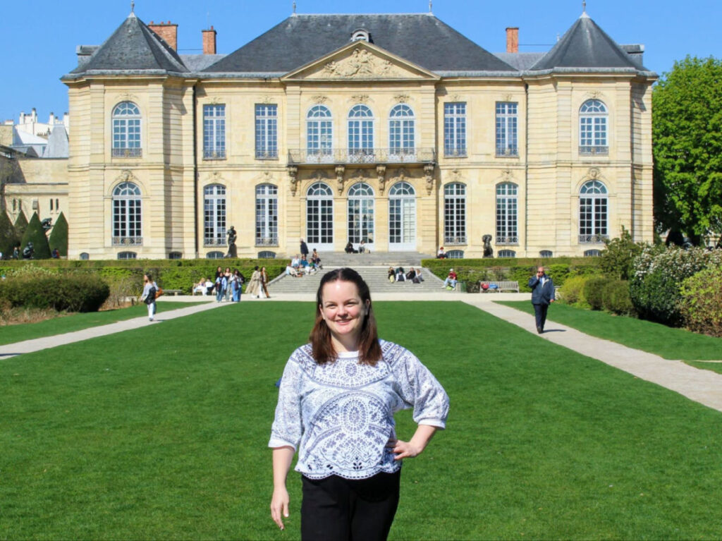 Author Rachel standing in front of the Rodin Museum