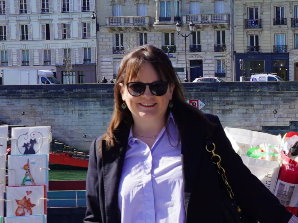 Author Rachel wearing Sunglasses in Paris
