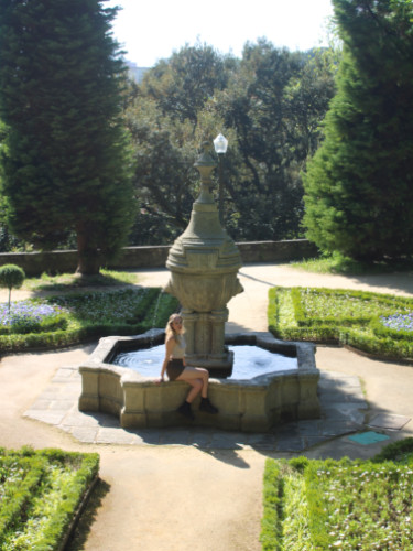 Author Sky sitting at the fountain in Jardins do Palácio de Cristal
