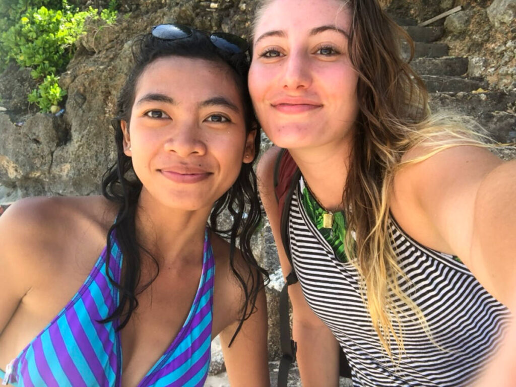 Author Sky with her friend on a beach in Bali