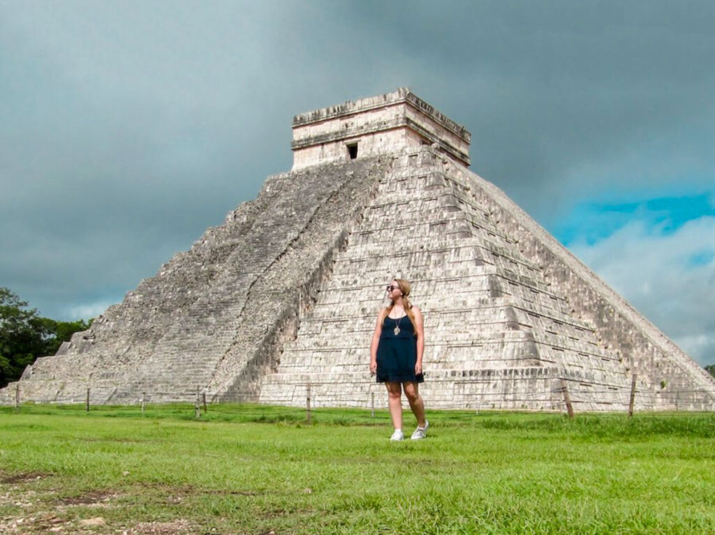 Author Taylor standing at Chichen Itza