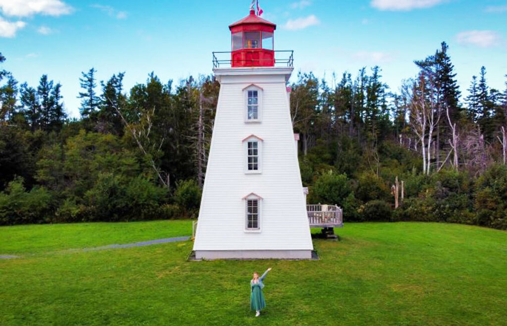 Aerial view of the author Taylor and Cape Bear Lighthouse in Prince Edward Island
