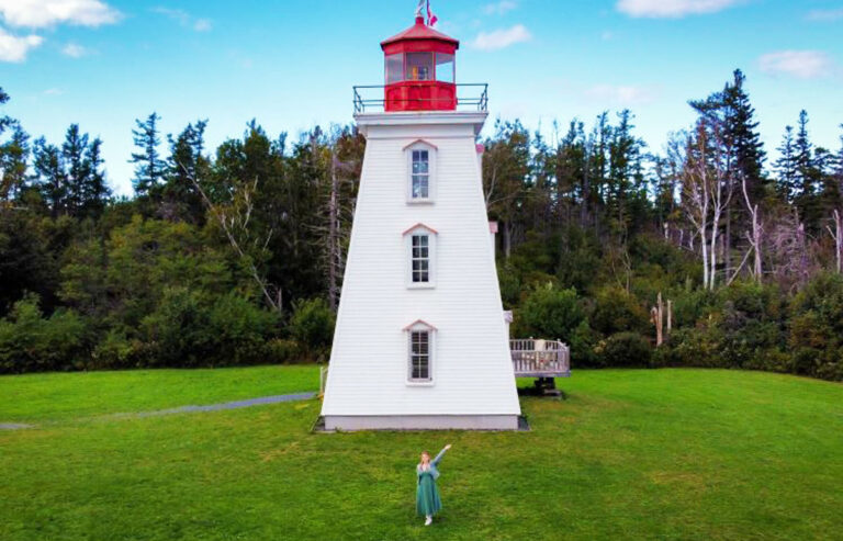 Aerial view of the author Taylor and Cape Bear Lighthouse in Prince Edward Island