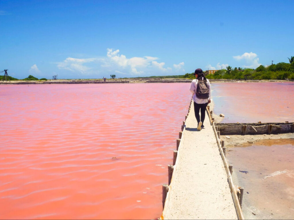 The author Vanessa walking through the Pink Salt Lakes in Cabo Rojo