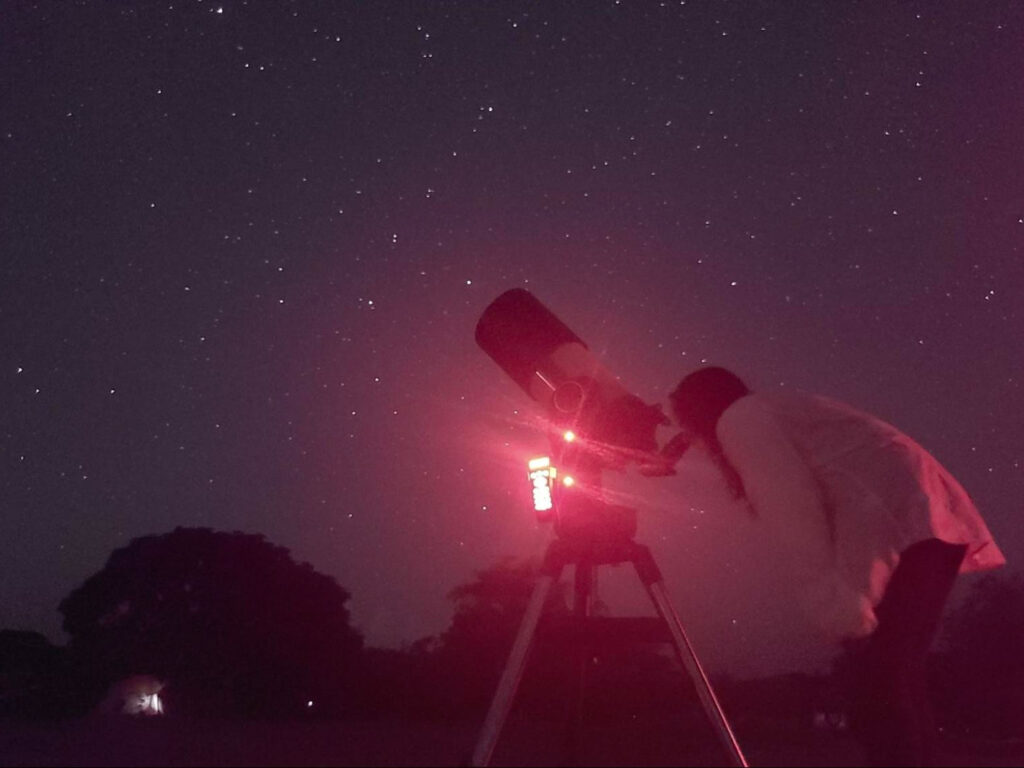 Author Vanessa admiring Saturn through one of AODACE’s telescopes
