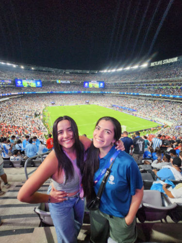 The author's friends posing for a photo at the bleachers in MetLife Stadium