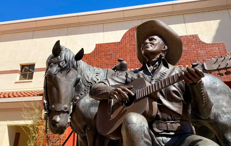 A statue of a man and a horse in Autry Museum of the American West