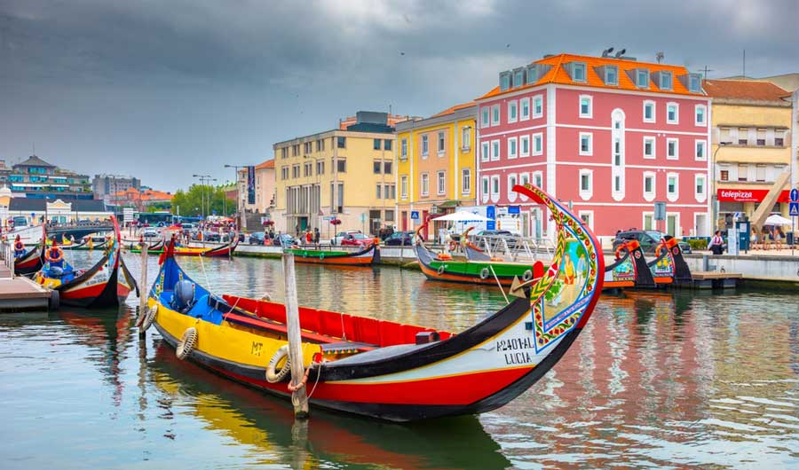 View of colorful boats at the Aveiro’s canals