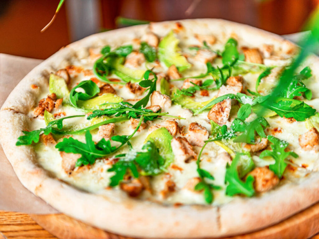 Closeup look of the avocado pizza
