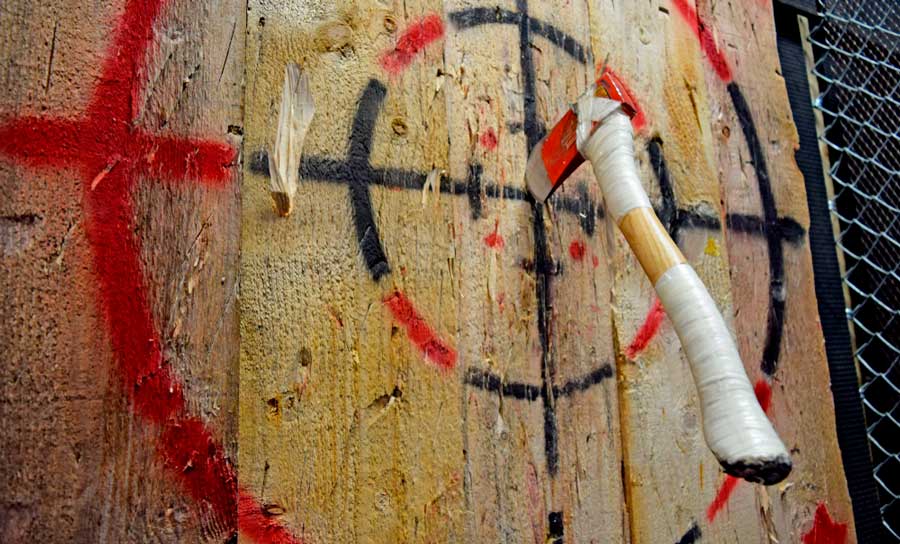 An axe on a bullseye target in Axehole Las Vegas