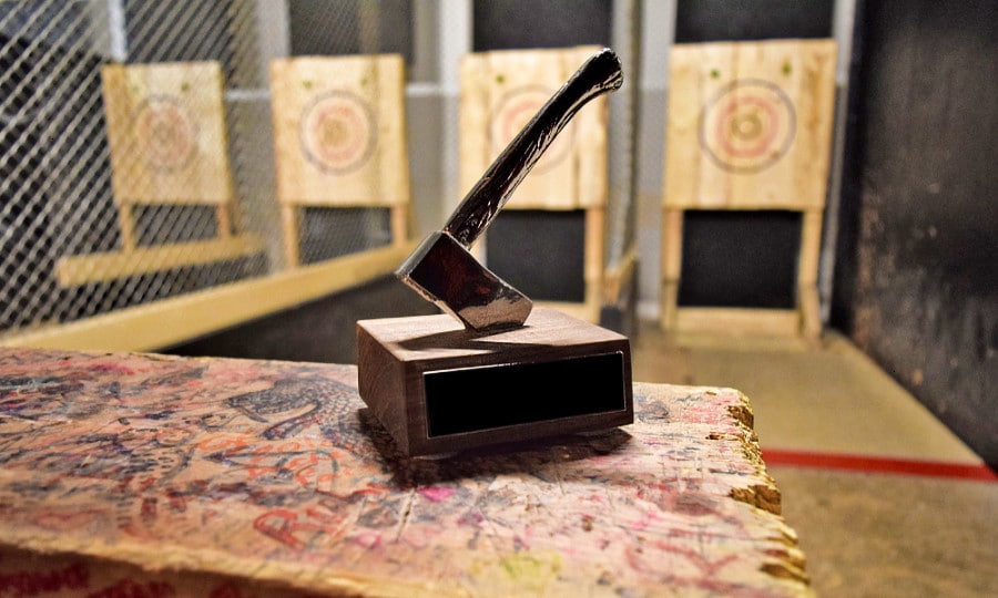 An axe-throwing trophy displayed inside the axe-throwing hall in Axehole Vegas