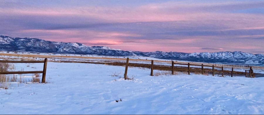 View of the campsite next to Meadow Hot Springs in winter sunset