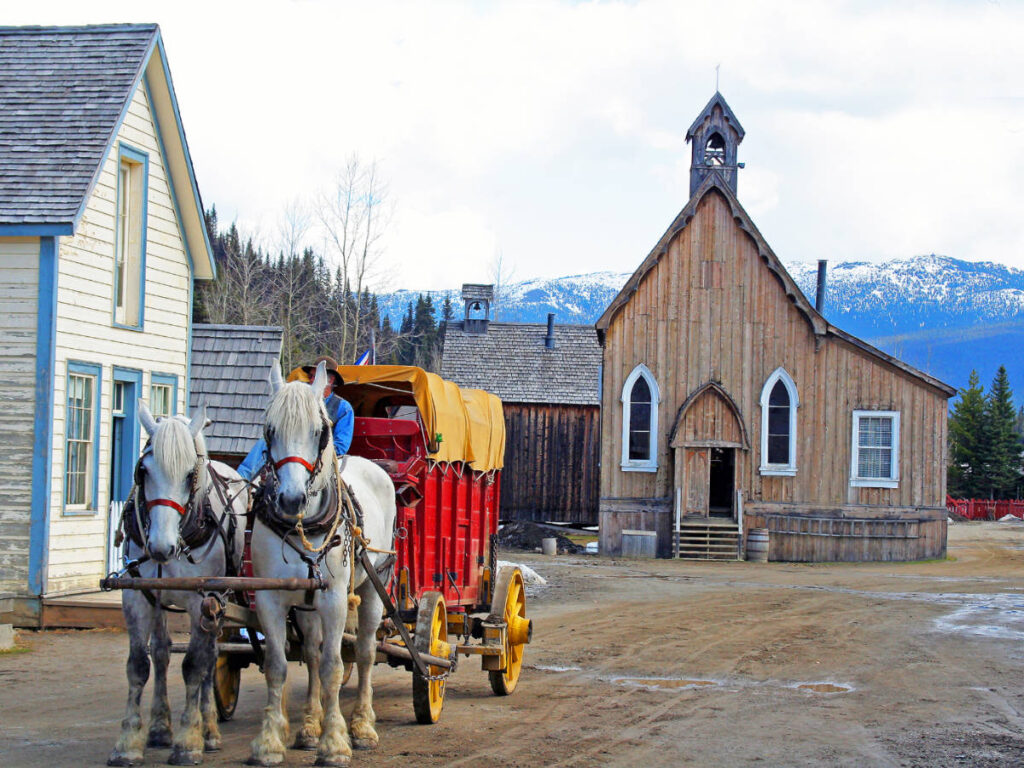 Horses pulling a wagon at the Barkerville town
