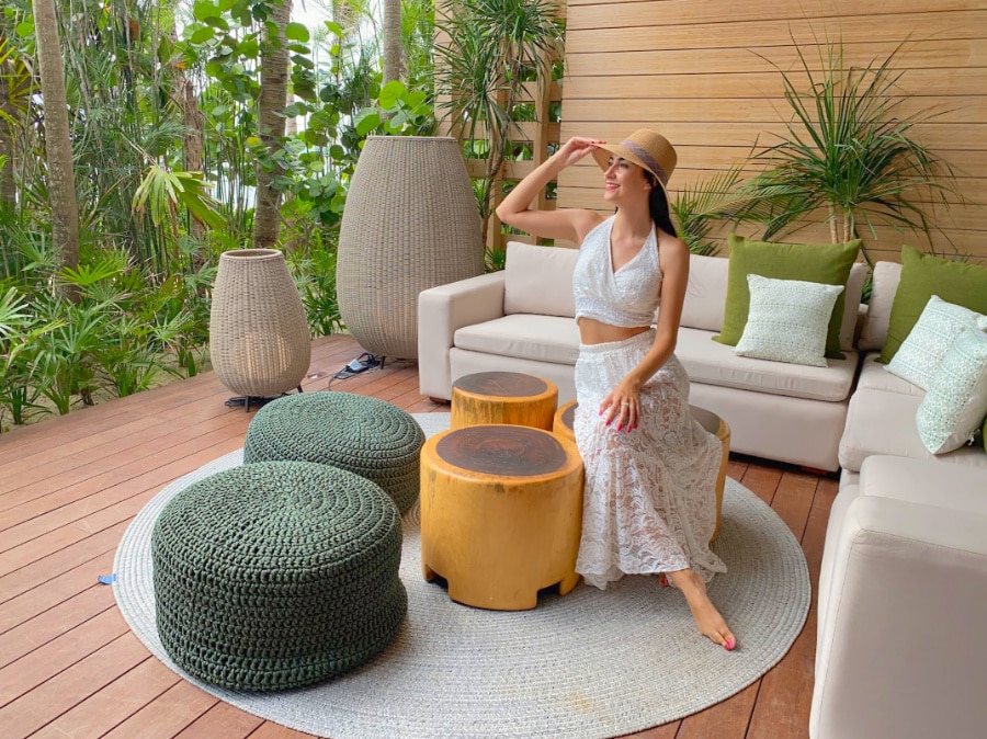Clara posing for a picture in a terrace at Banyan Tree Mayakoba