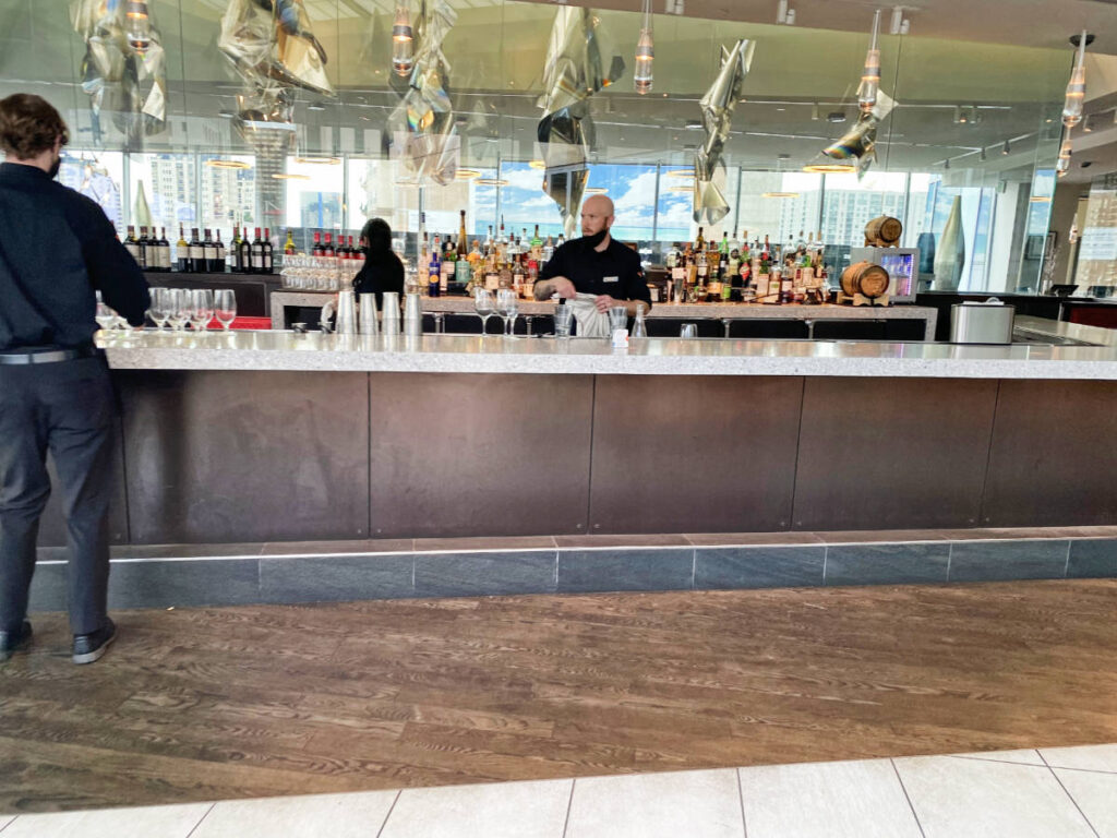 A bartender on a bar in Denver Art Hotel