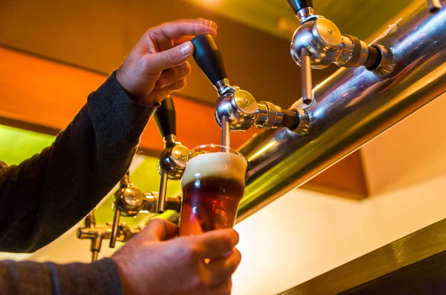Beer being taken on a beer tap in Barrelhouse Brewing