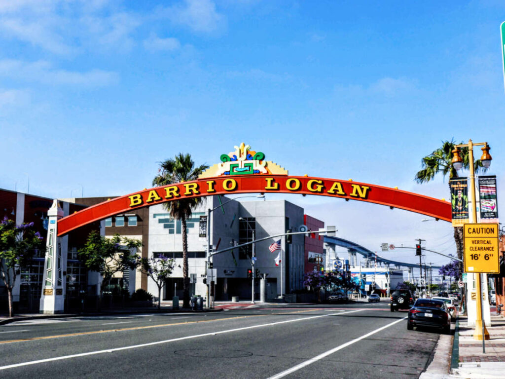 View of the welcome arch of Barrio Logan over the street