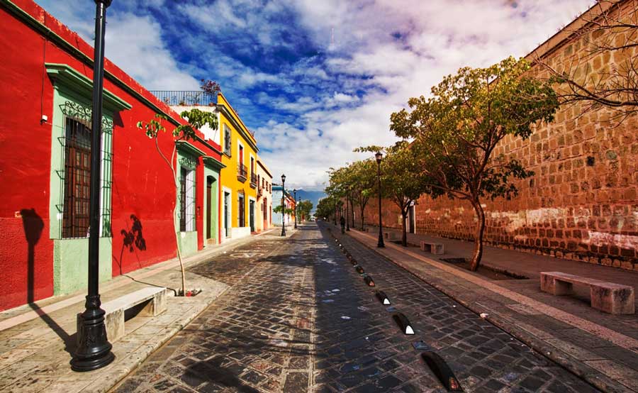 View of colorful buildings in a street in Barrio de Xochimilco