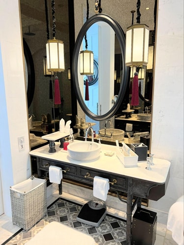 A bathroom sink with a mirror at the Department of Conchology