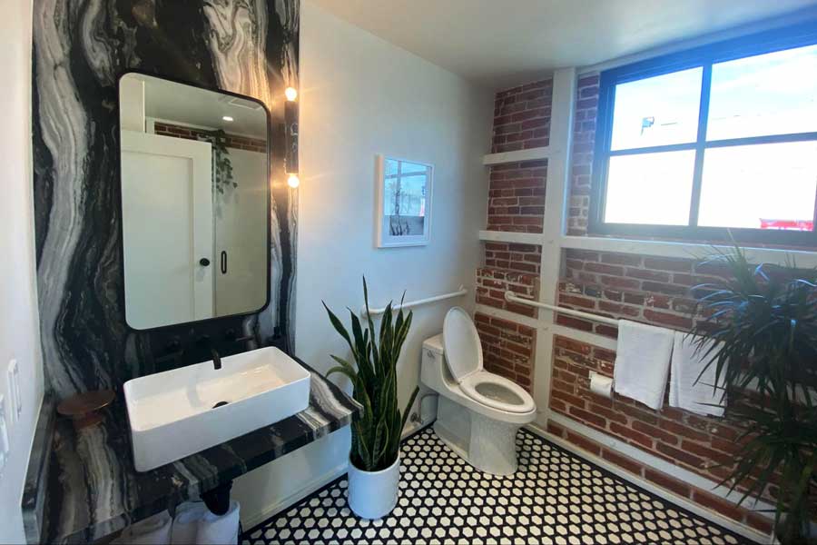 View from the interior of a bathroom in The Brick Hotel