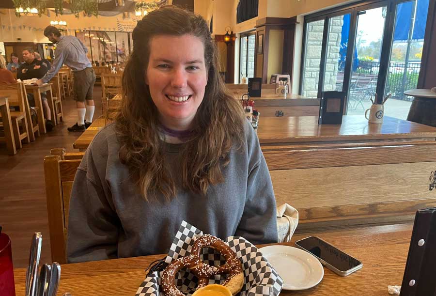 The author about to eat the pretzel with bier cheese dipping sauce served in Bavarian Bierhaus