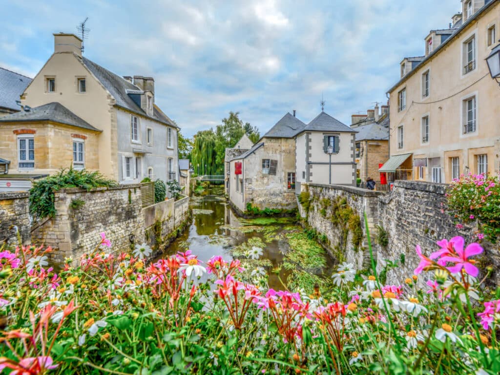 Stone buildings and waterfront at the Bayeux