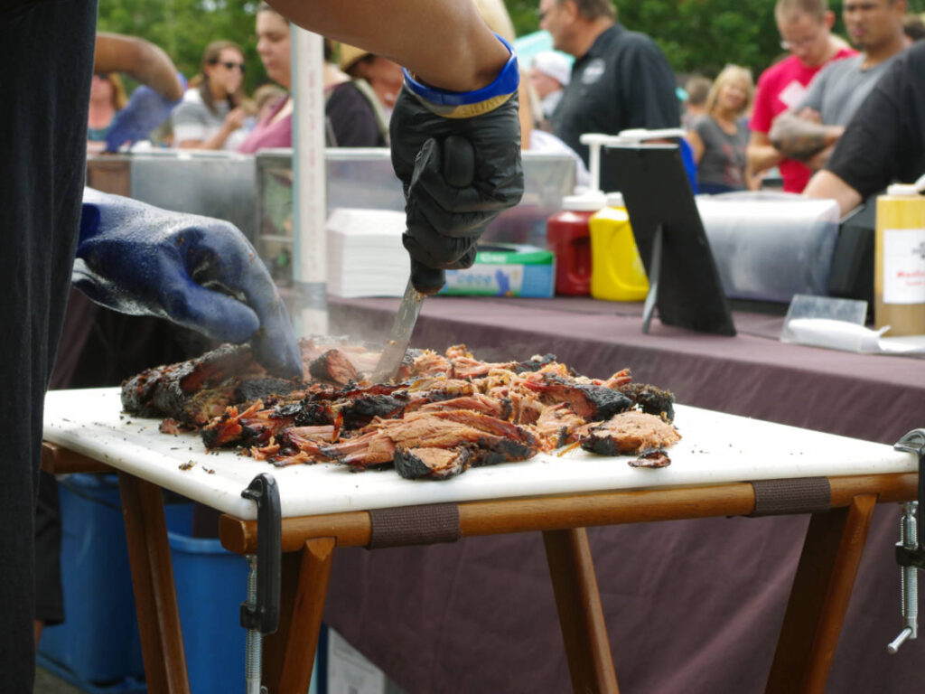 Bbq being sliced at Windy City Smokeout