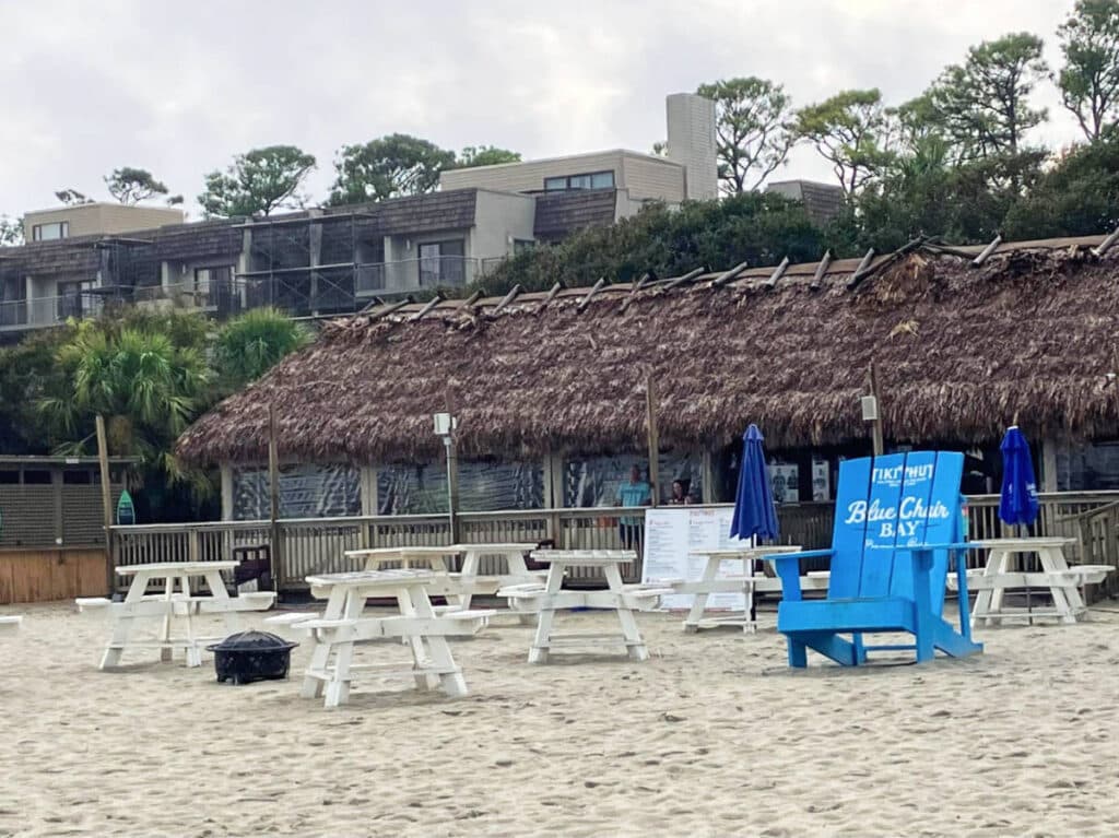 Chairs and tables on the beach area in Beach House Resort, Hilton Head Island