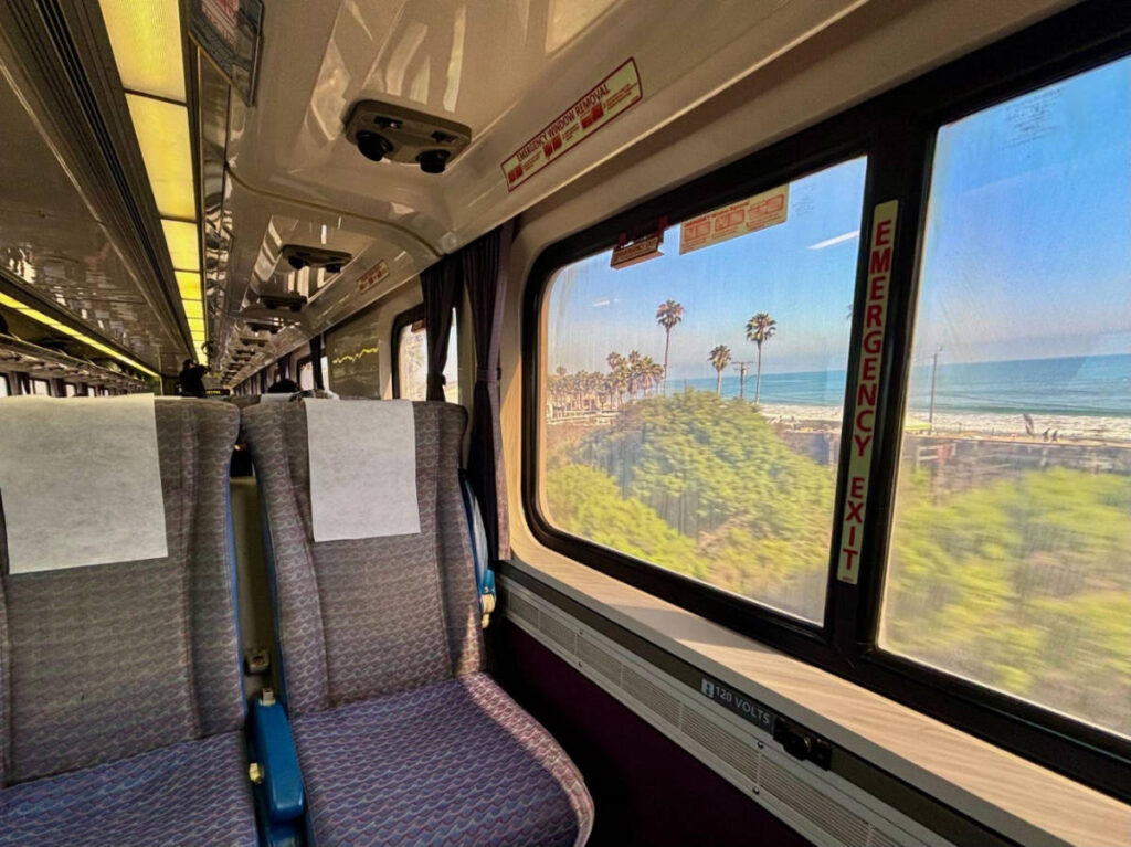 The Pacific Surfliner train passing by one of the beach towns in California