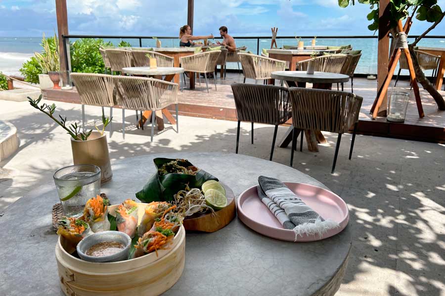 View of the beach while eating on a restaurant in Mezzanine