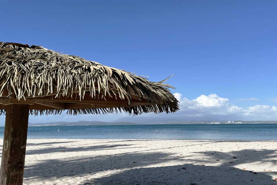 View of the white sand and blue water at the El Conquistador Resort
