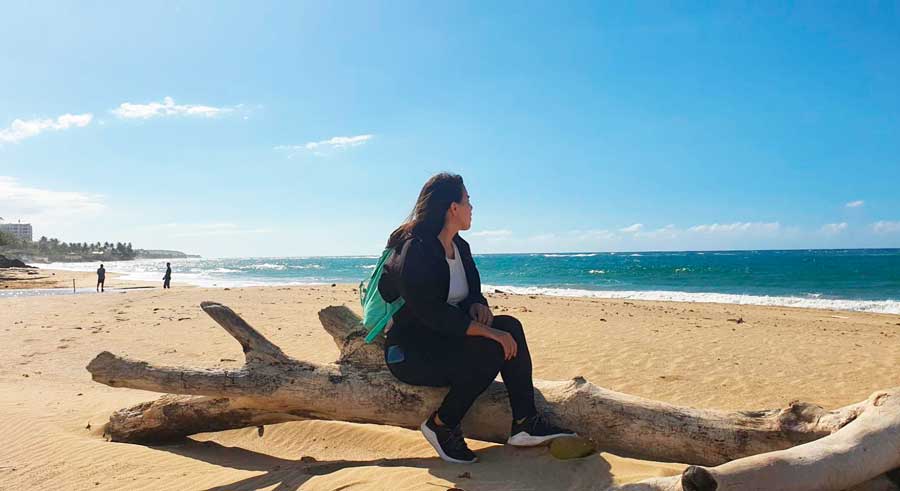 The author Vanessa admiring the view in Aguada