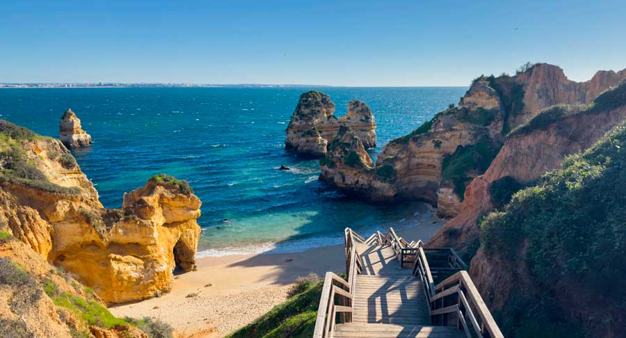 A wooden staircase heading to the beach in Algarve