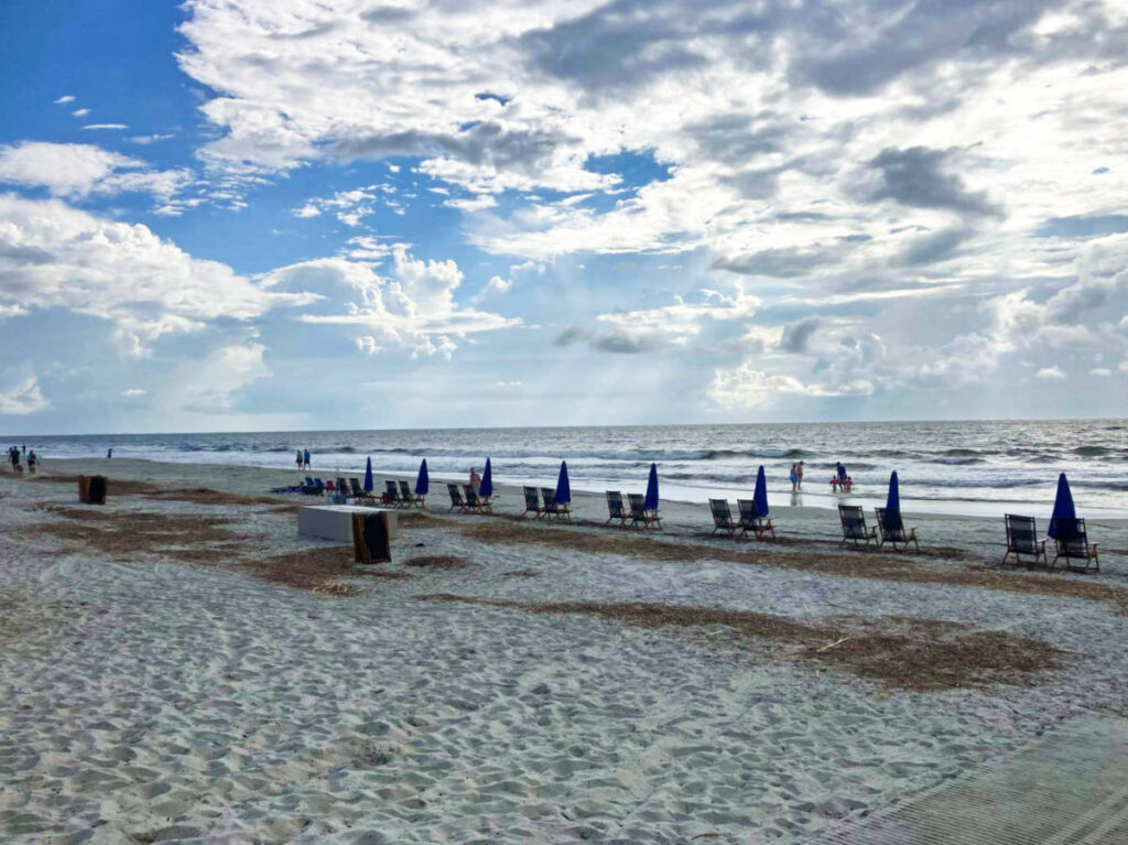 View of the seating area along the shoreline of the white sand beach in Hilton Head